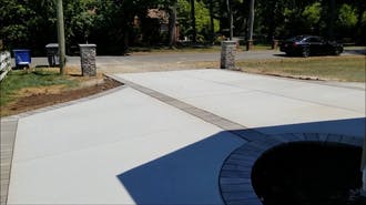 New concrete driveway in a neighborhood in East Bay, CA.